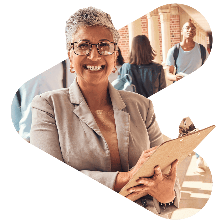 woman professor holding a clipboard and wearing glasses