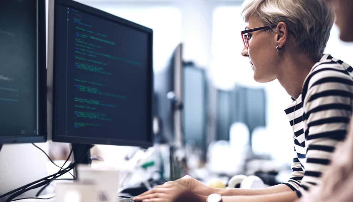 Engineer at work in front of a computer