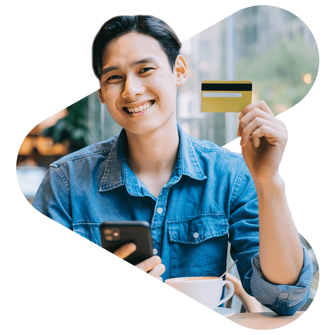 Korean person holding credit card