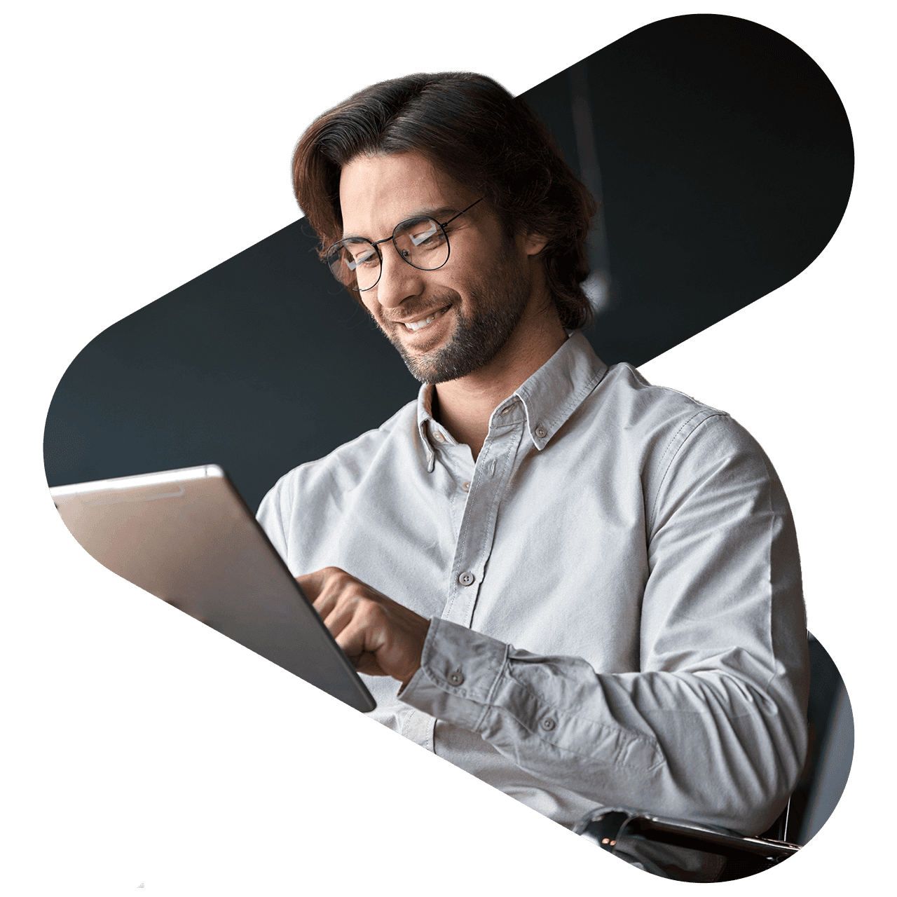 Business man smiling while looking at a computer