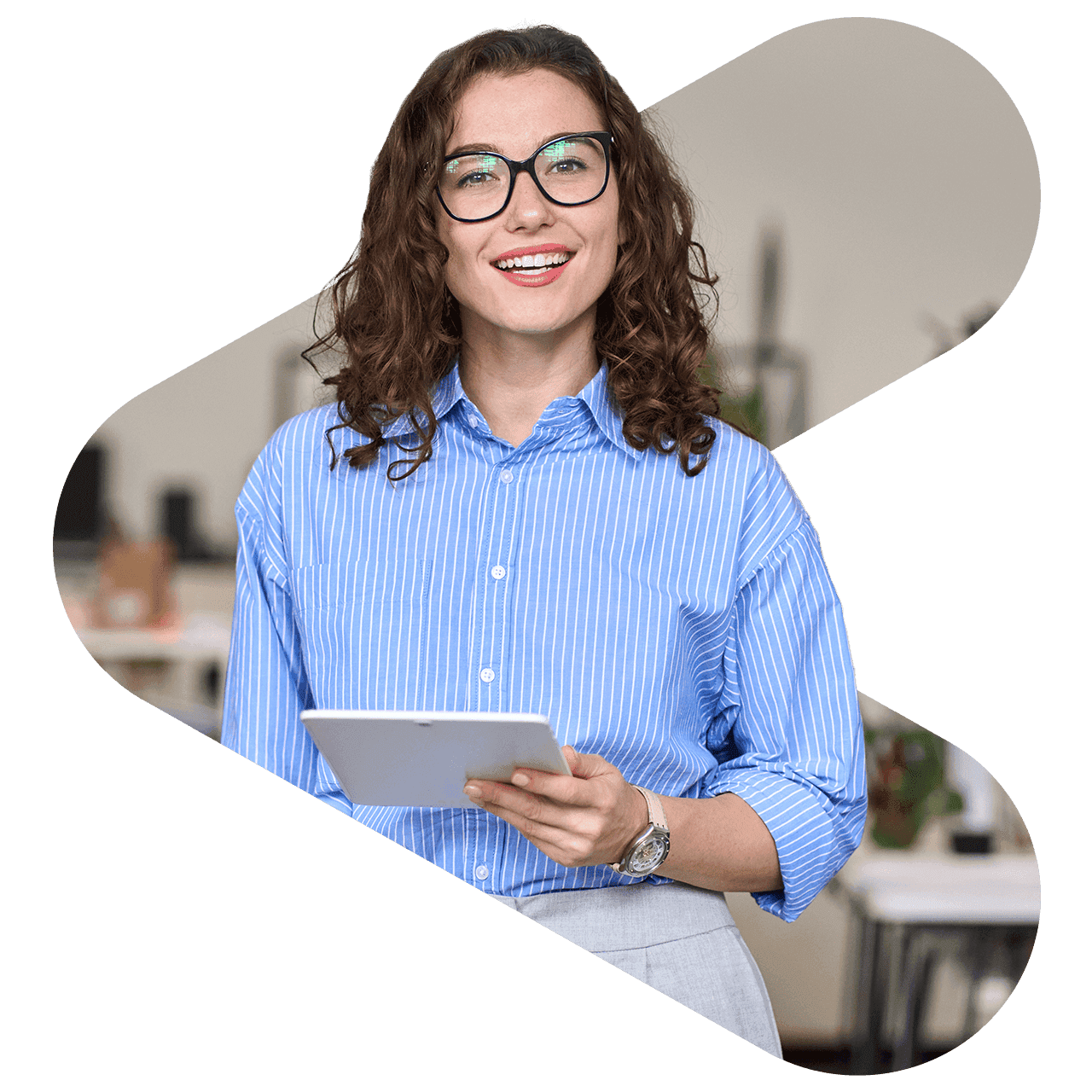 woman using tablet wearing glasses and blue shirt