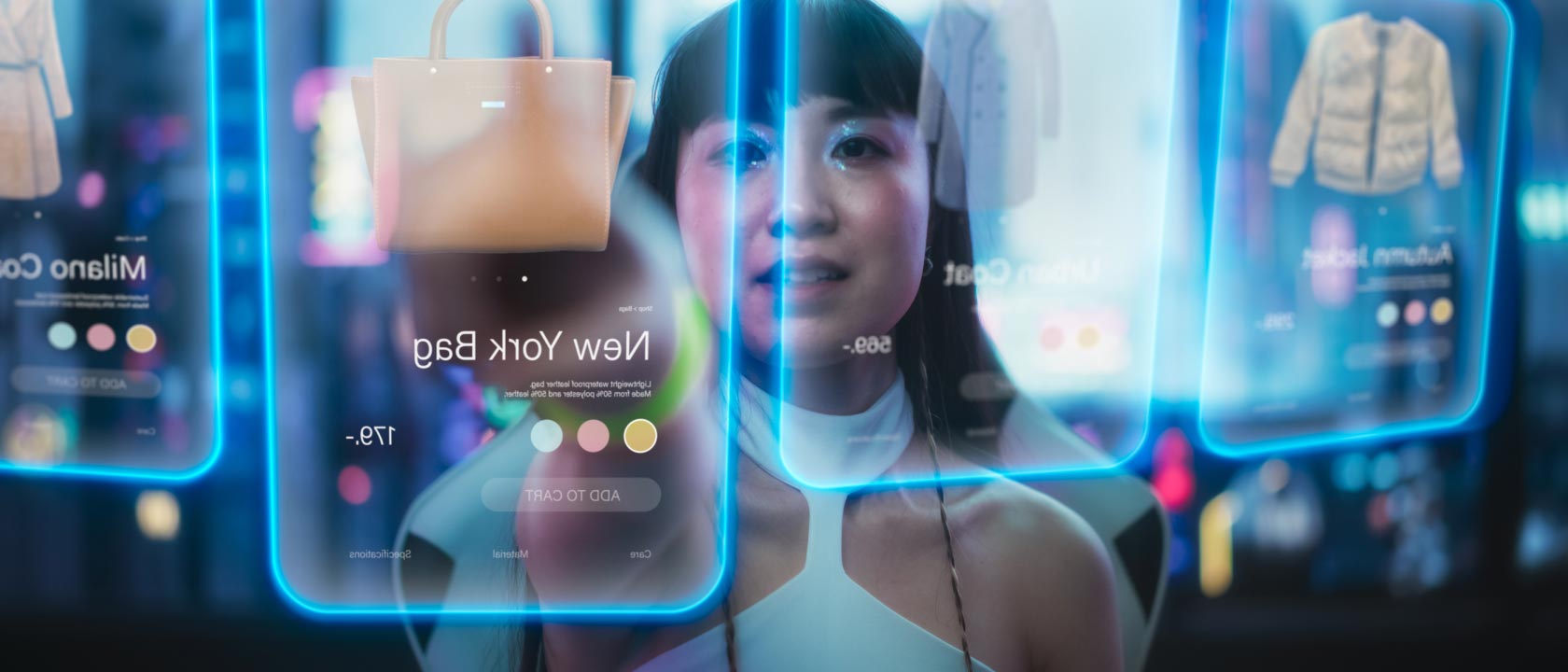 A woman is interacting with futuristic, floating images that look like phone screens
