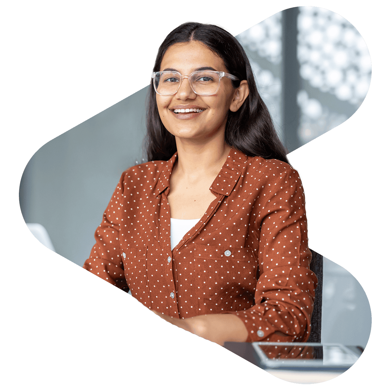 woman working at a desk using her laptop