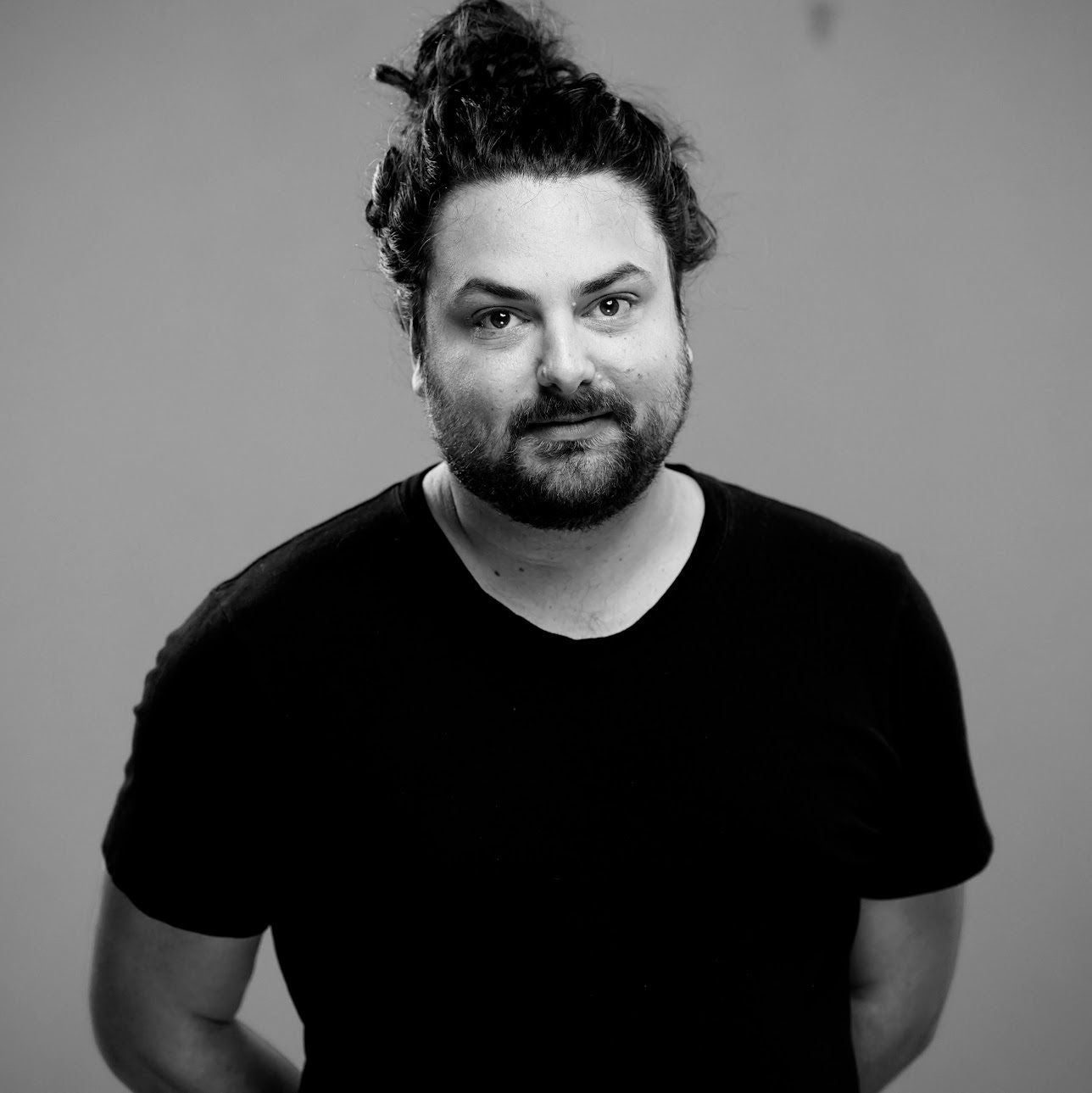 Headshot-style photo of Myles Borins of Snowflake