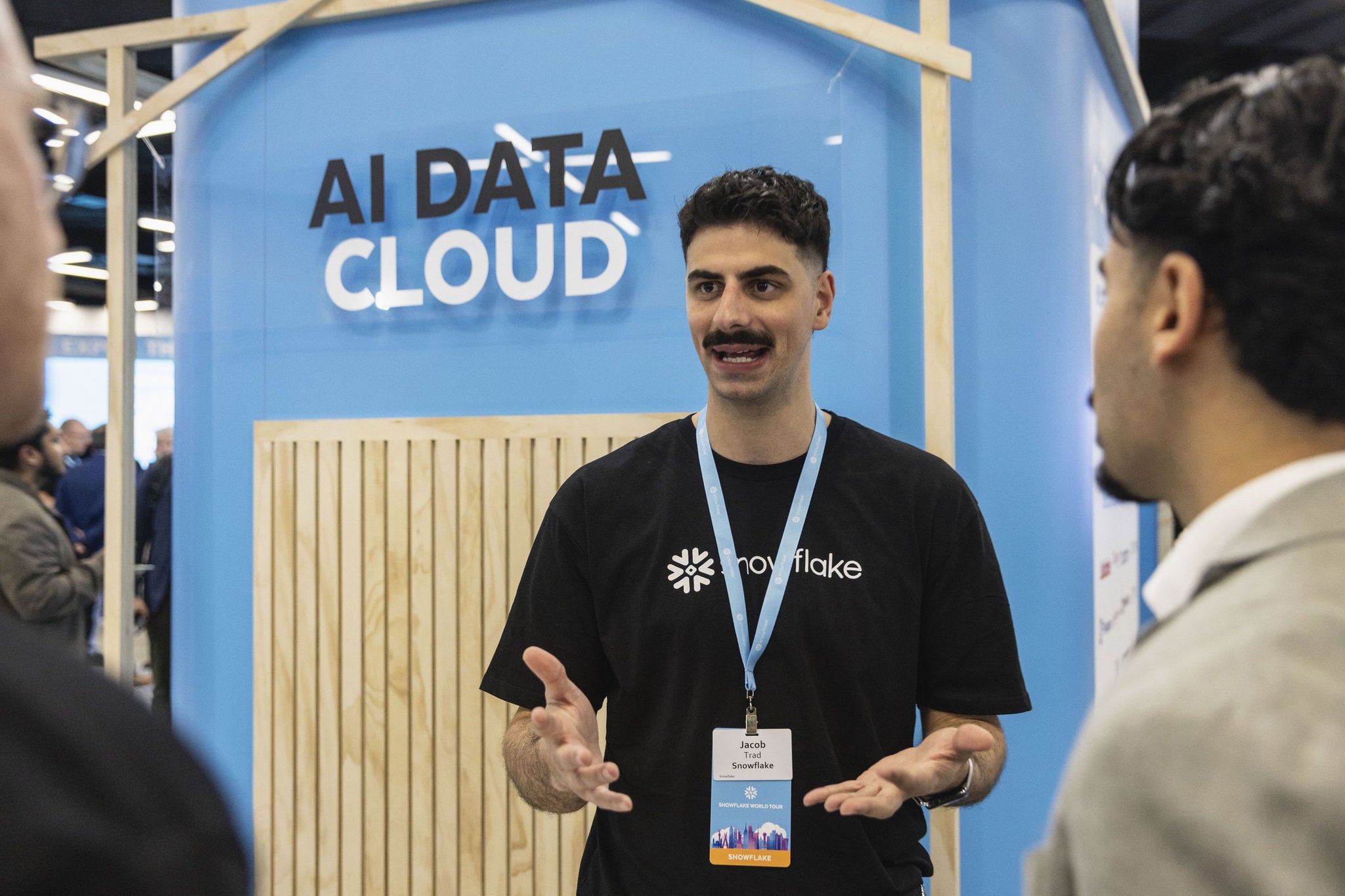 Snowflake employee Jacob Trad speaking at AI Data Cloud booth