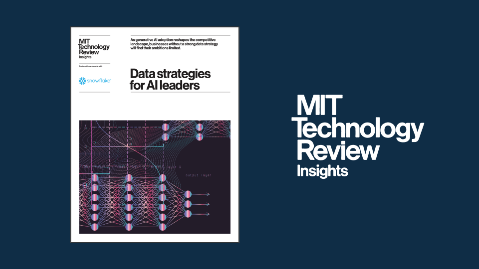 Data engineer sitting in front of a computer
