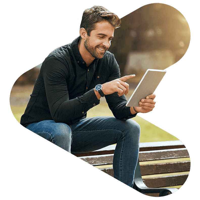 Man looking at an ipad