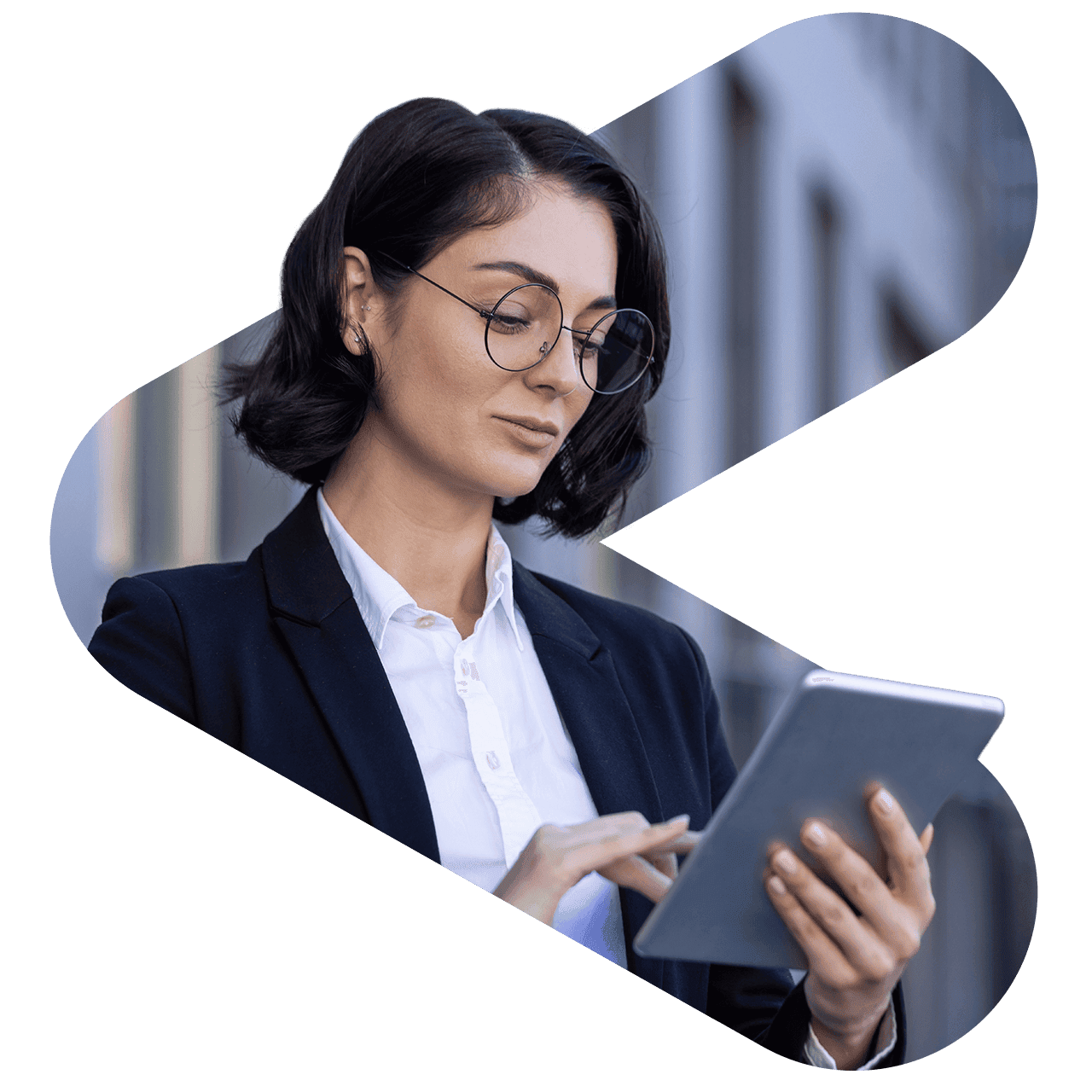two woman working together holding a tablet