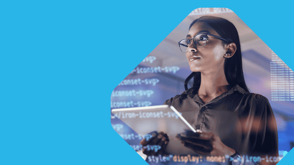 Hands typing on a laptop computer