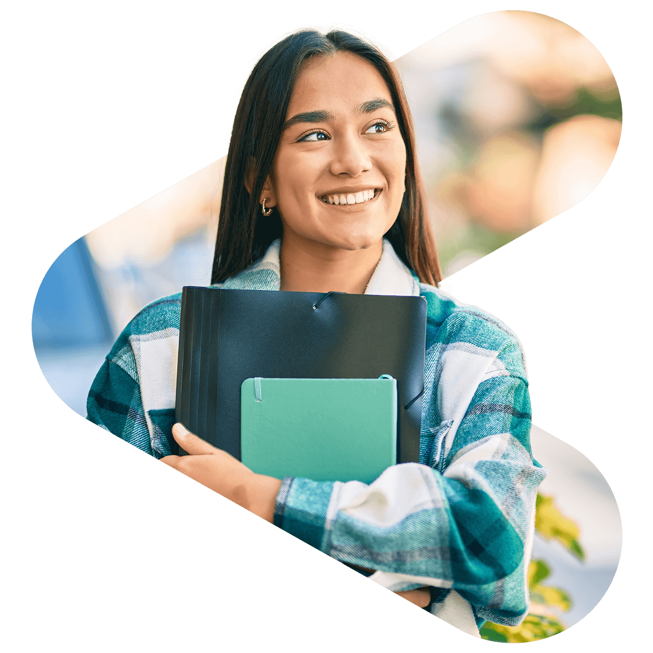 student holding text books