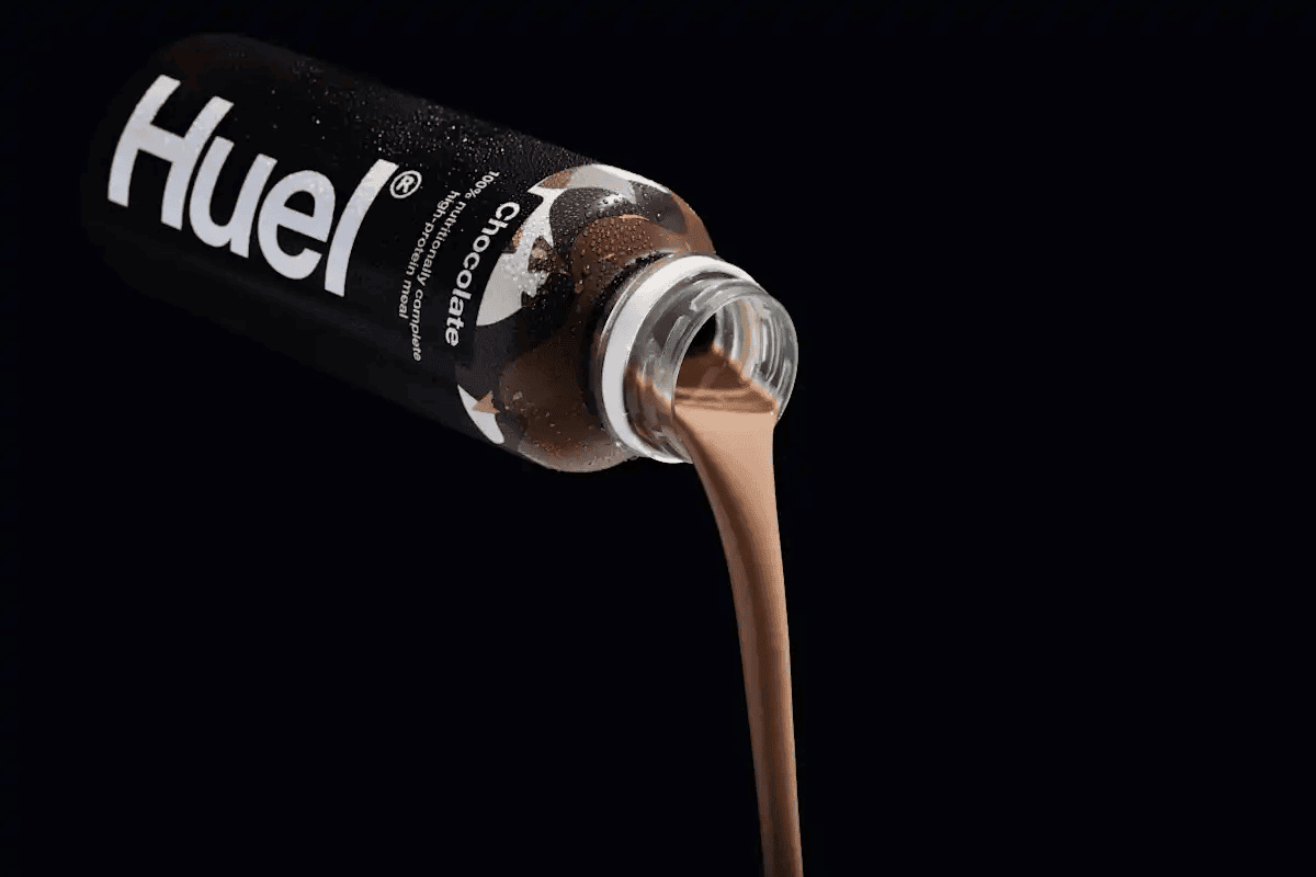 huel protein shake pouring out of bottle