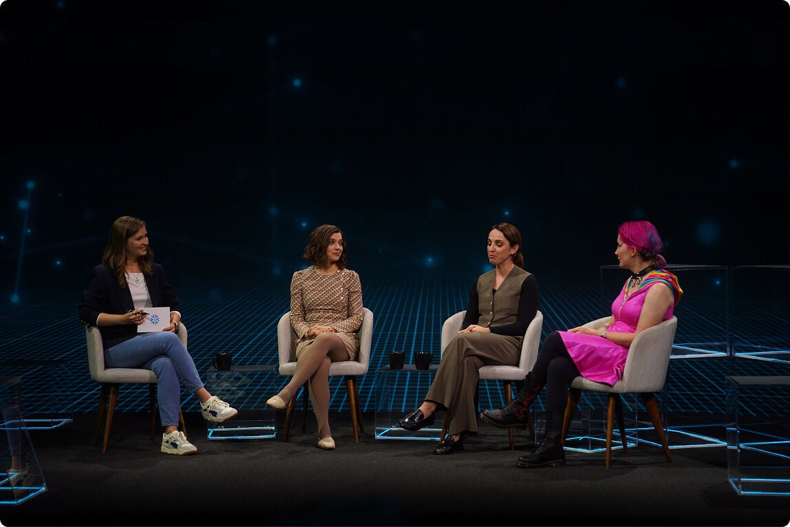 Group of panelists onstage at Snowflake Expedition 2025