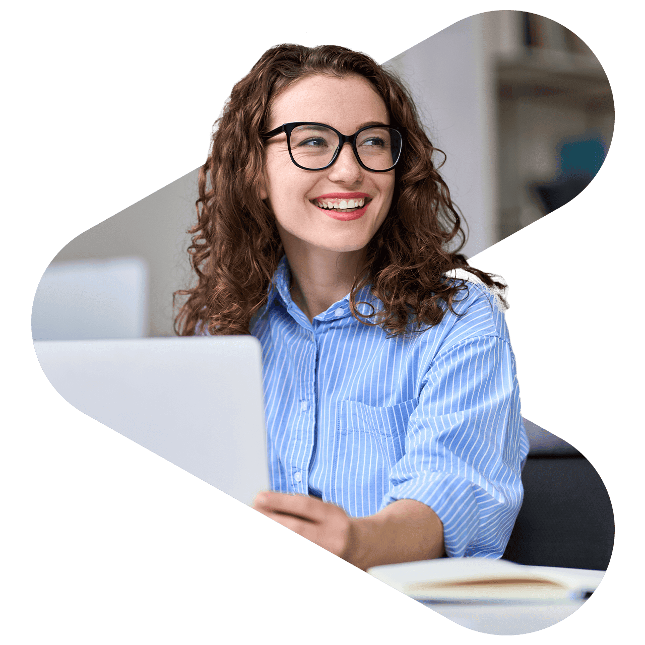 woman working at a desk using her laptop