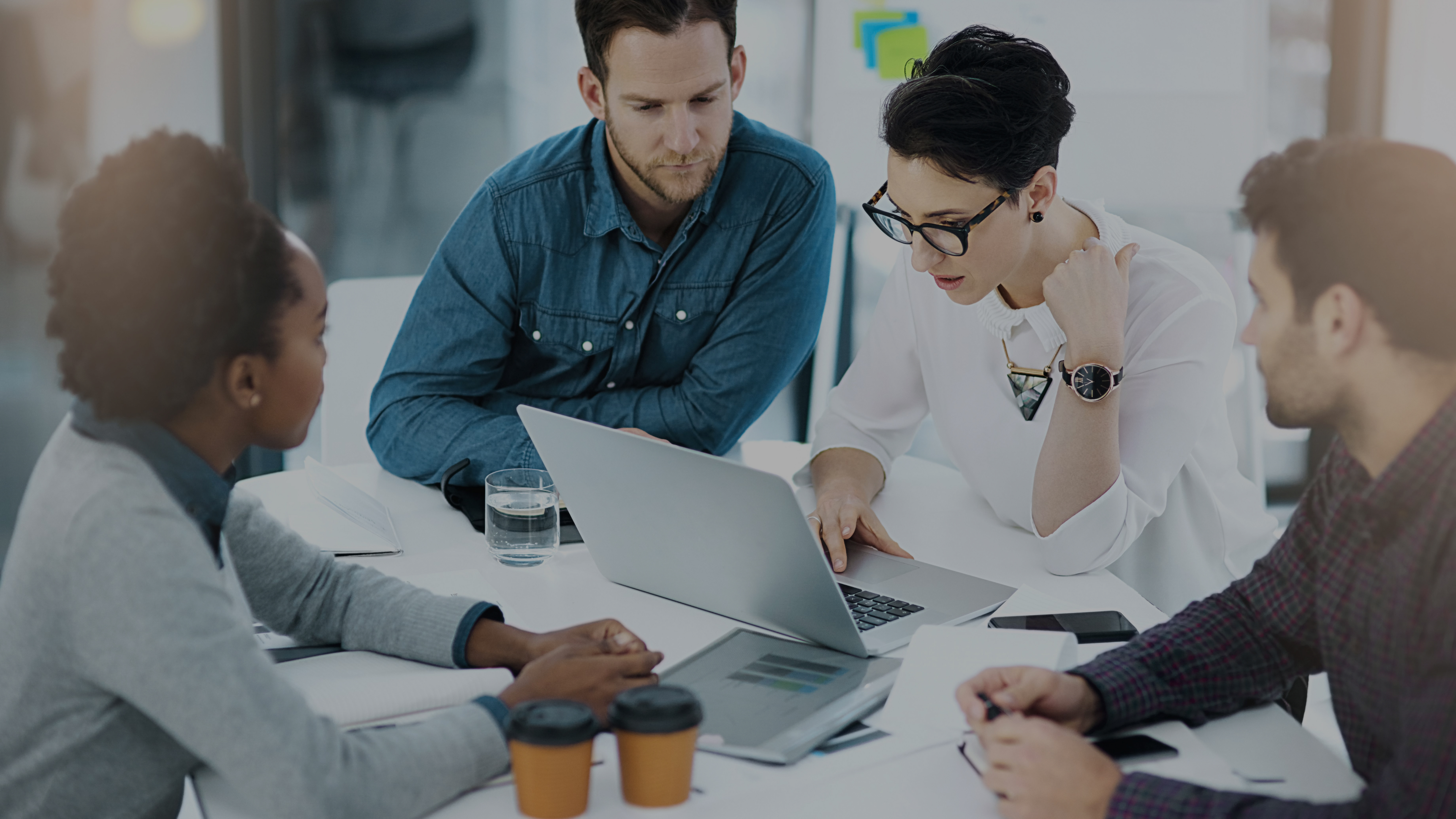 People collaborating infront of the computer