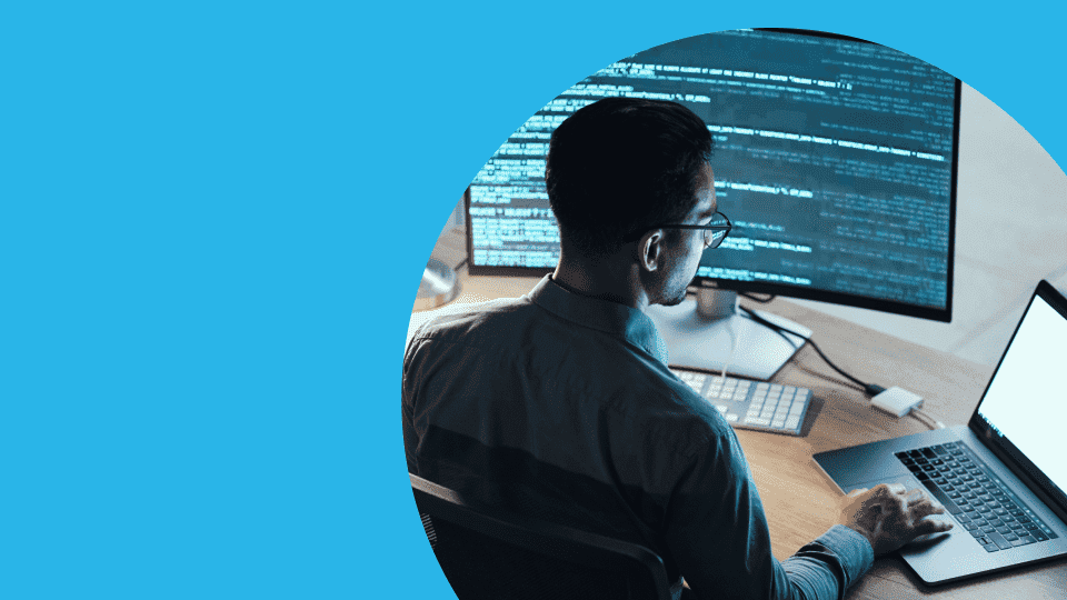 Digital illustration of a person's hands typing on a keyboard with graphs and charts superimposed over the.