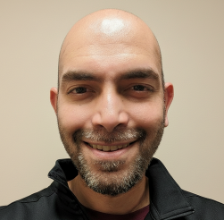 Headshot-style photo of Vikram Raman of Snowflake