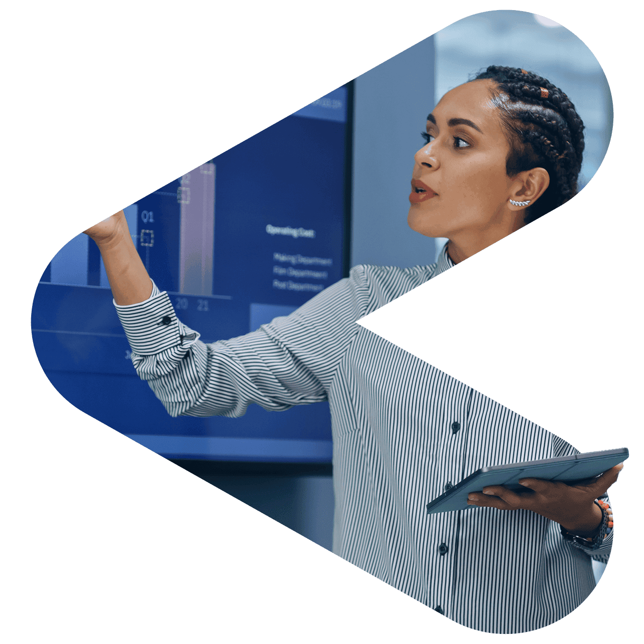 woman holding tablet pointing at data on tv screen