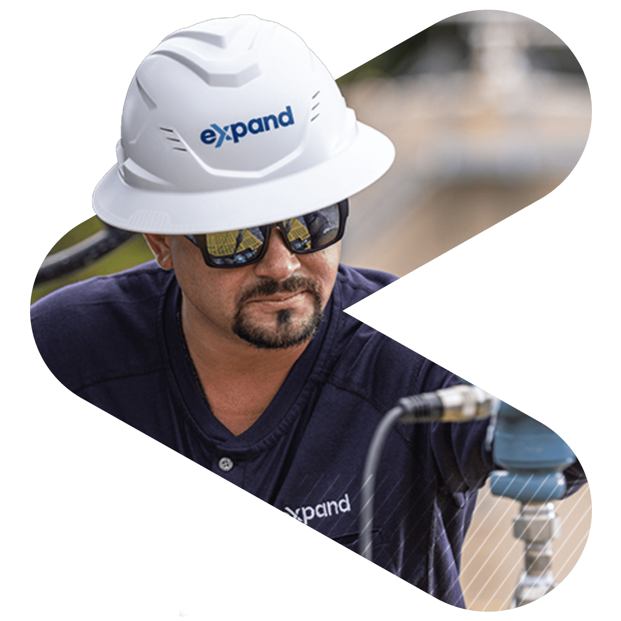 student holding ipad and notebooks