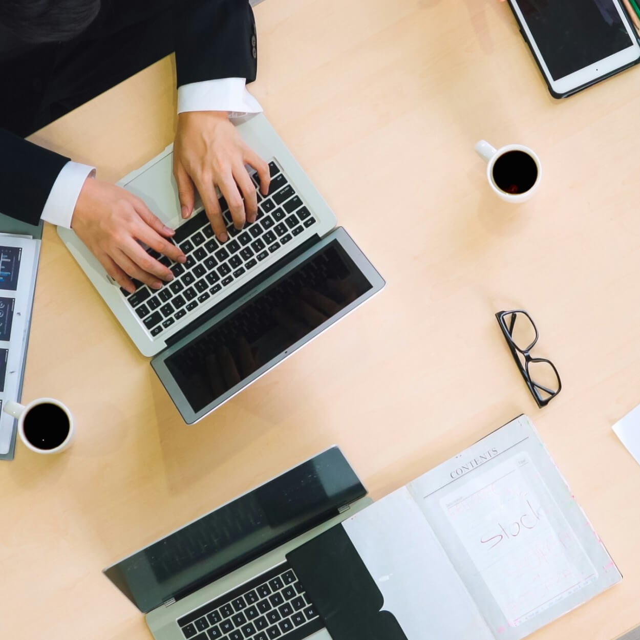  worker using laptop on desk
