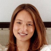 Headshot-style photo of Elisha Vukovic