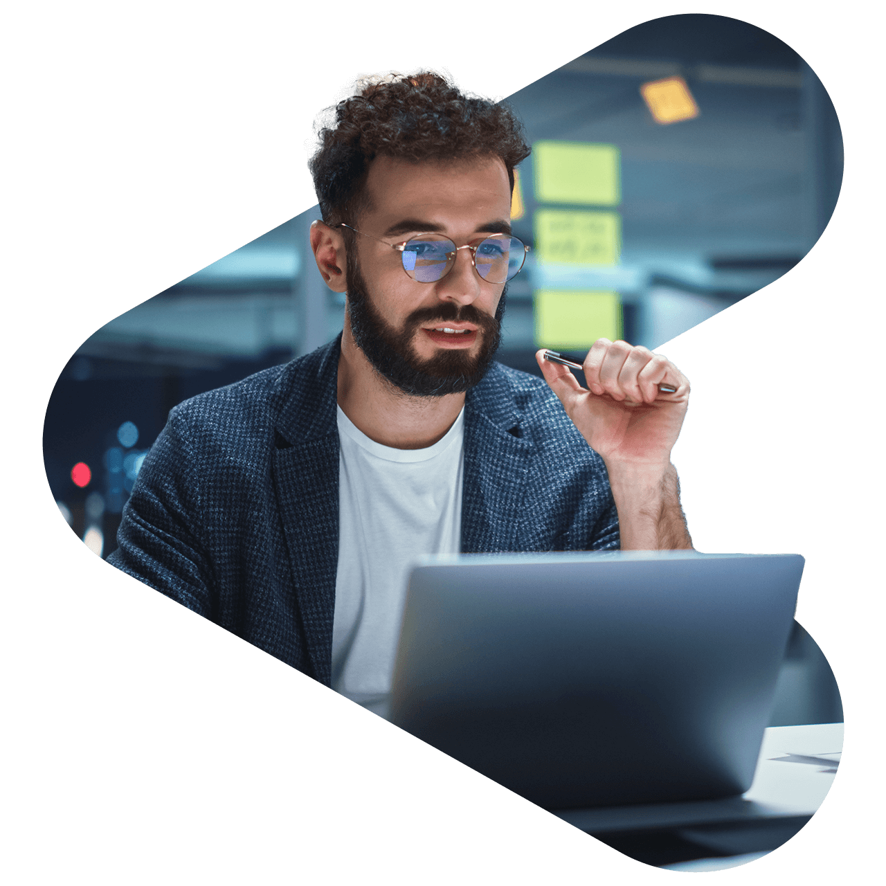 a man looking at a laptop screen