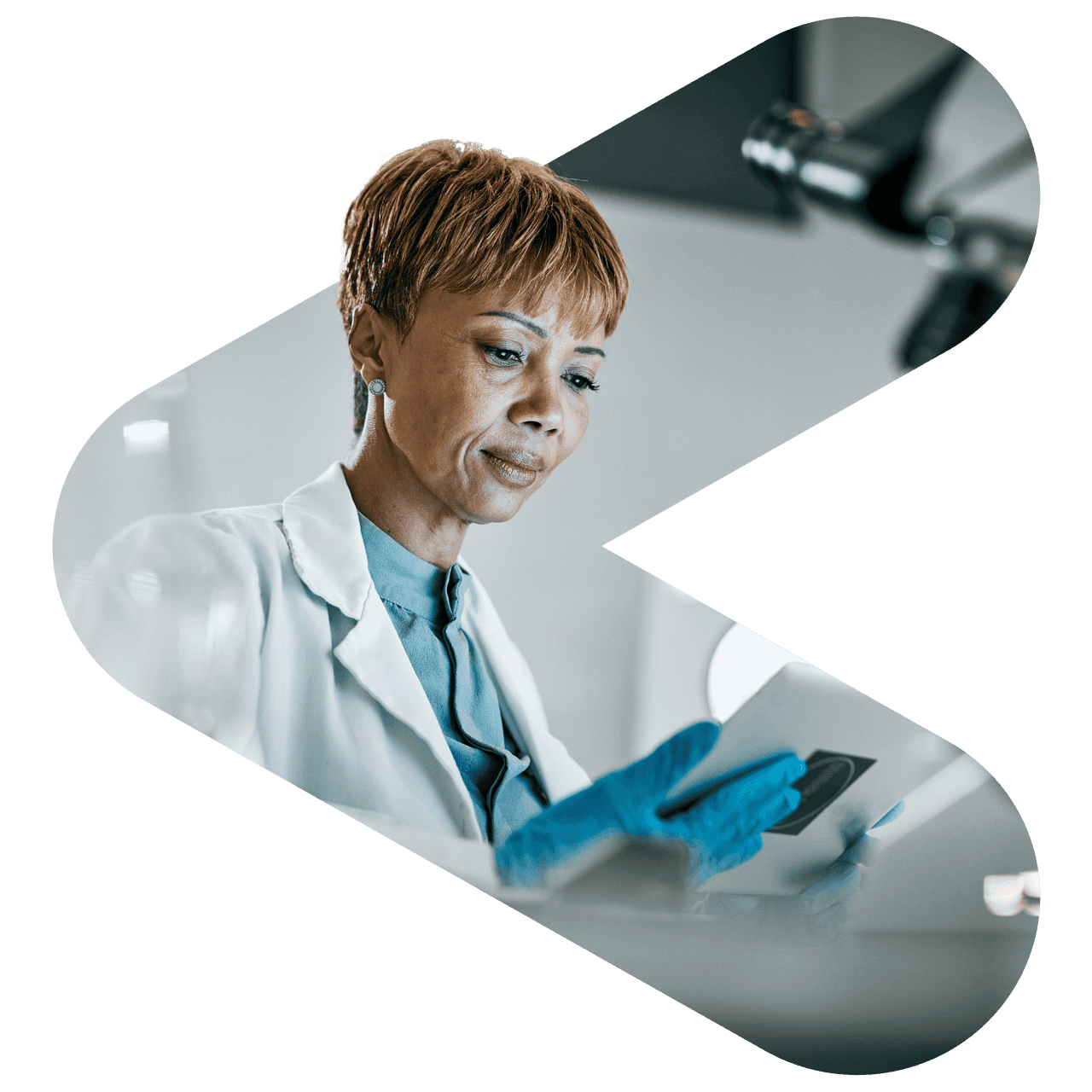 Doctor looking at medical data on her tablet