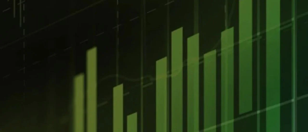 Stock photo of a green bar and line graph on a computer