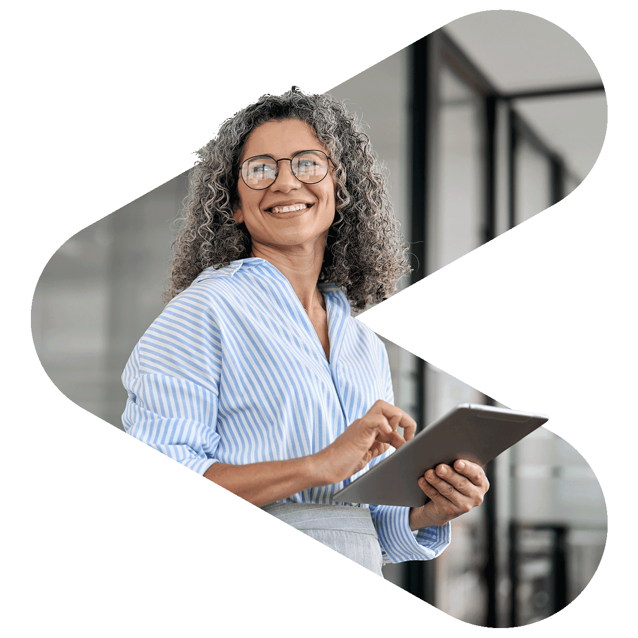 woman wearing glasses smiling while using tablet