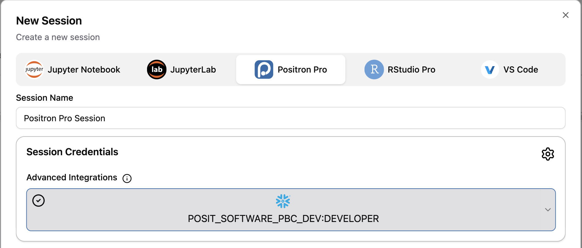 The New Session dialog with Positron Pro selected from the IDE row, and a Session Credentials panel below showing a checked Snowflake integration for the account POSIT_SOFTWARE_PBC_DEV:DEVELOPER