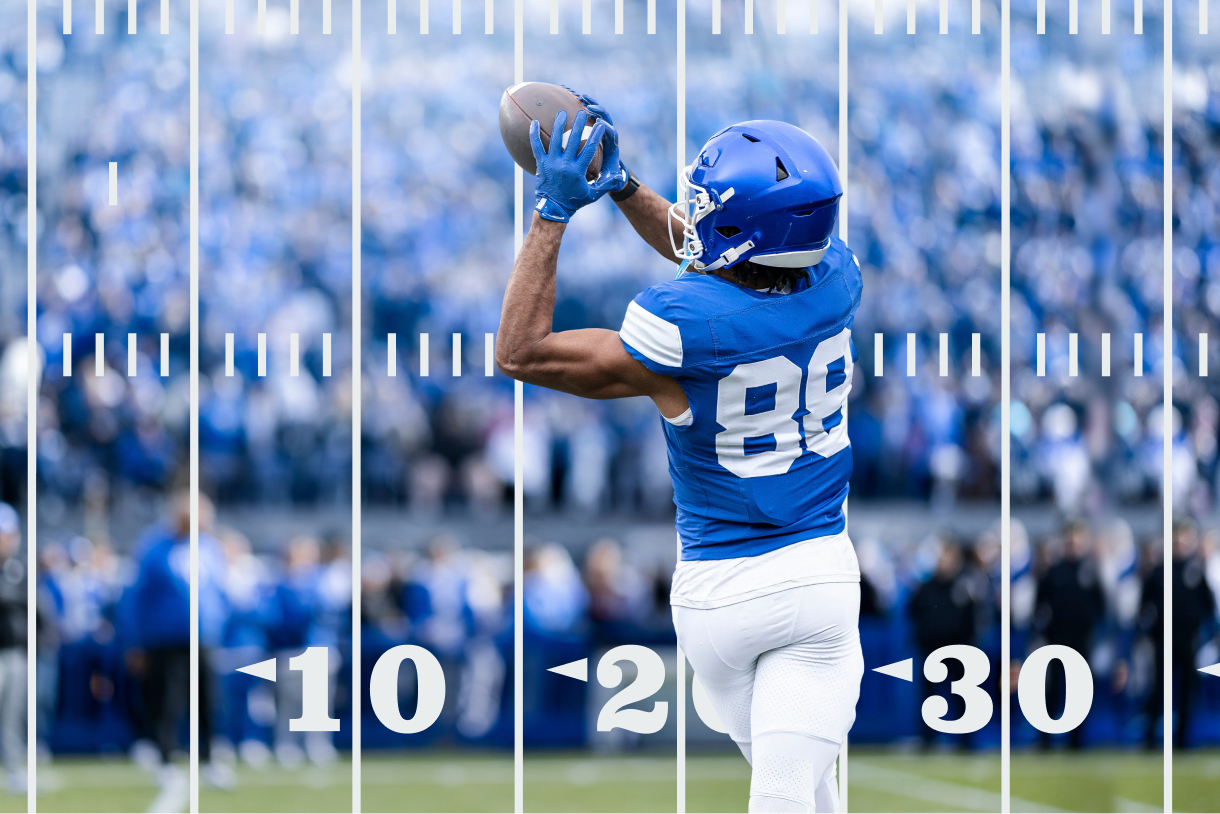 Football player catching a pass